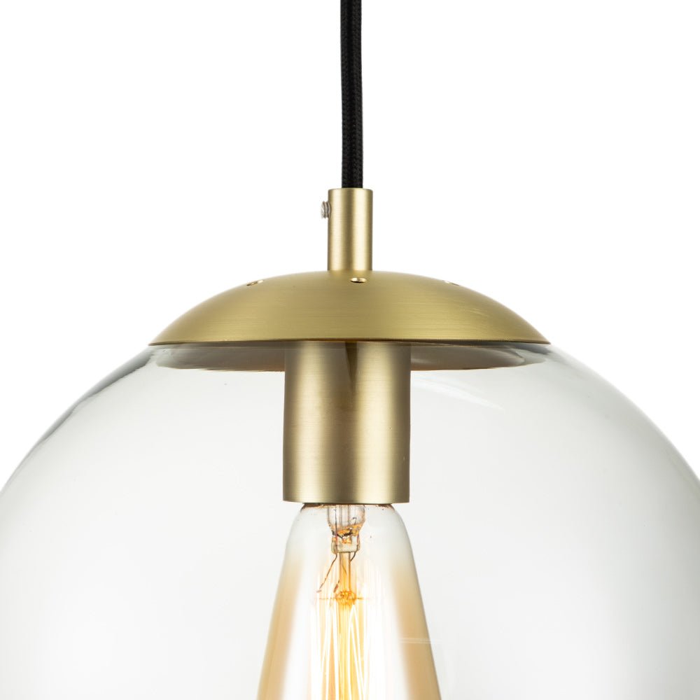 Modern Adjustable Single Light Glass Globe Pendant with Brushed Brass Finish