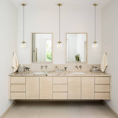 Modern Adjustable Single Light Glass Globe Pendant with Brushed Brass Finish