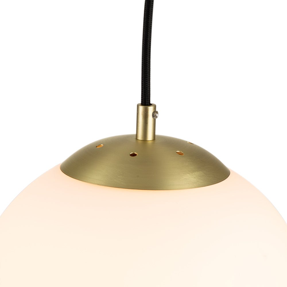 Modern Adjustable Single Light Glass Globe Pendant with Brushed Brass Finish